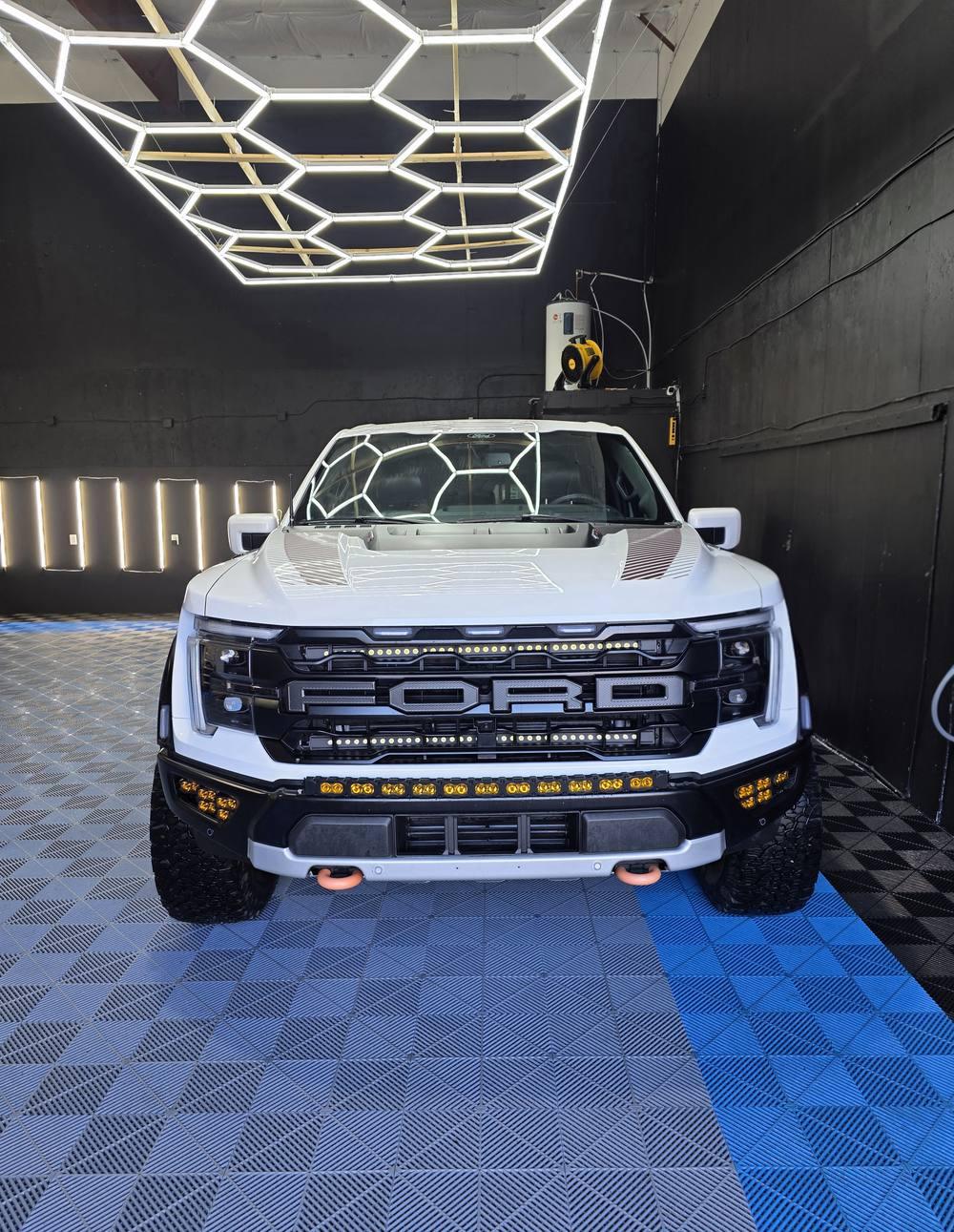 White Ford Raptor pickup truck detailed by Swoosh Autodetailing