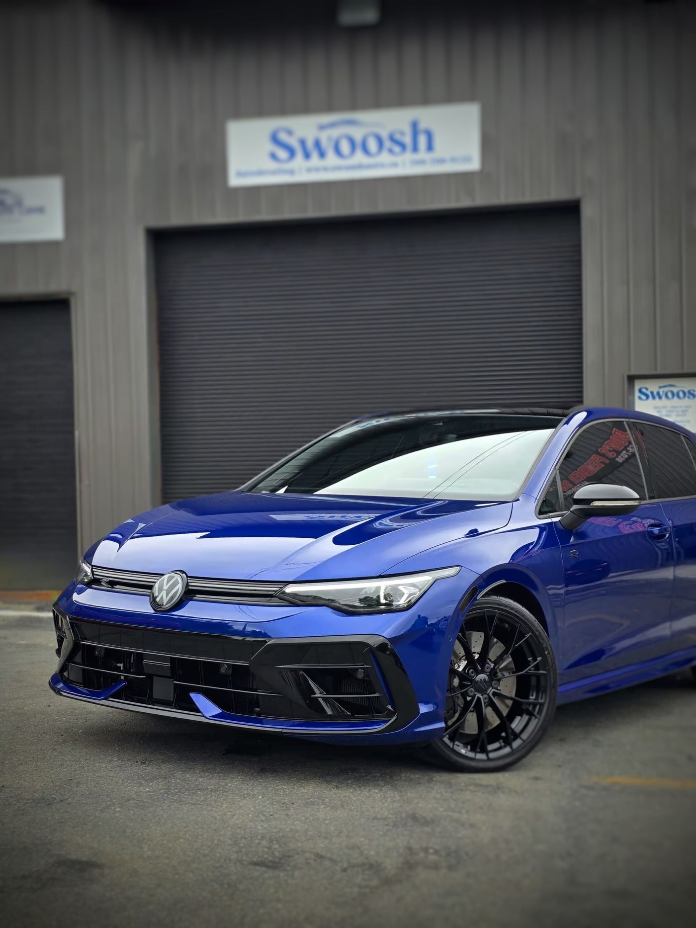 Freshly detailed blue Volkswagen Golf R outside the Swoosh Autodetailing shop in Mount Pearl